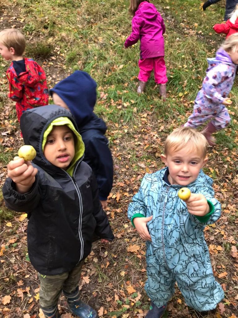 The children collecting crabapples